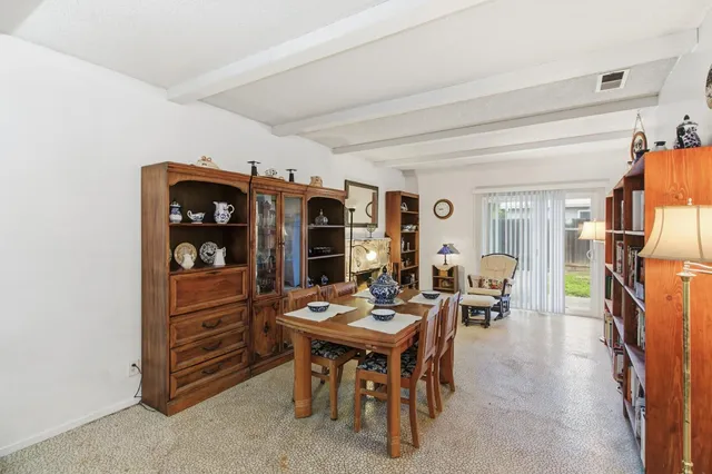 a view of a livingroom with furniture and window