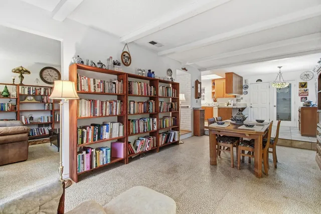 a view of a workspace with furniture and toys