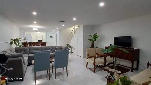 a view of a wooden deck with a lake