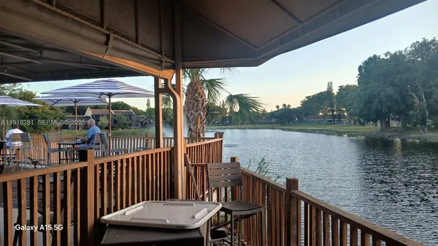 a view of a street with a building in the background