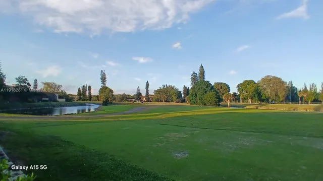 a view of a house with a big yard