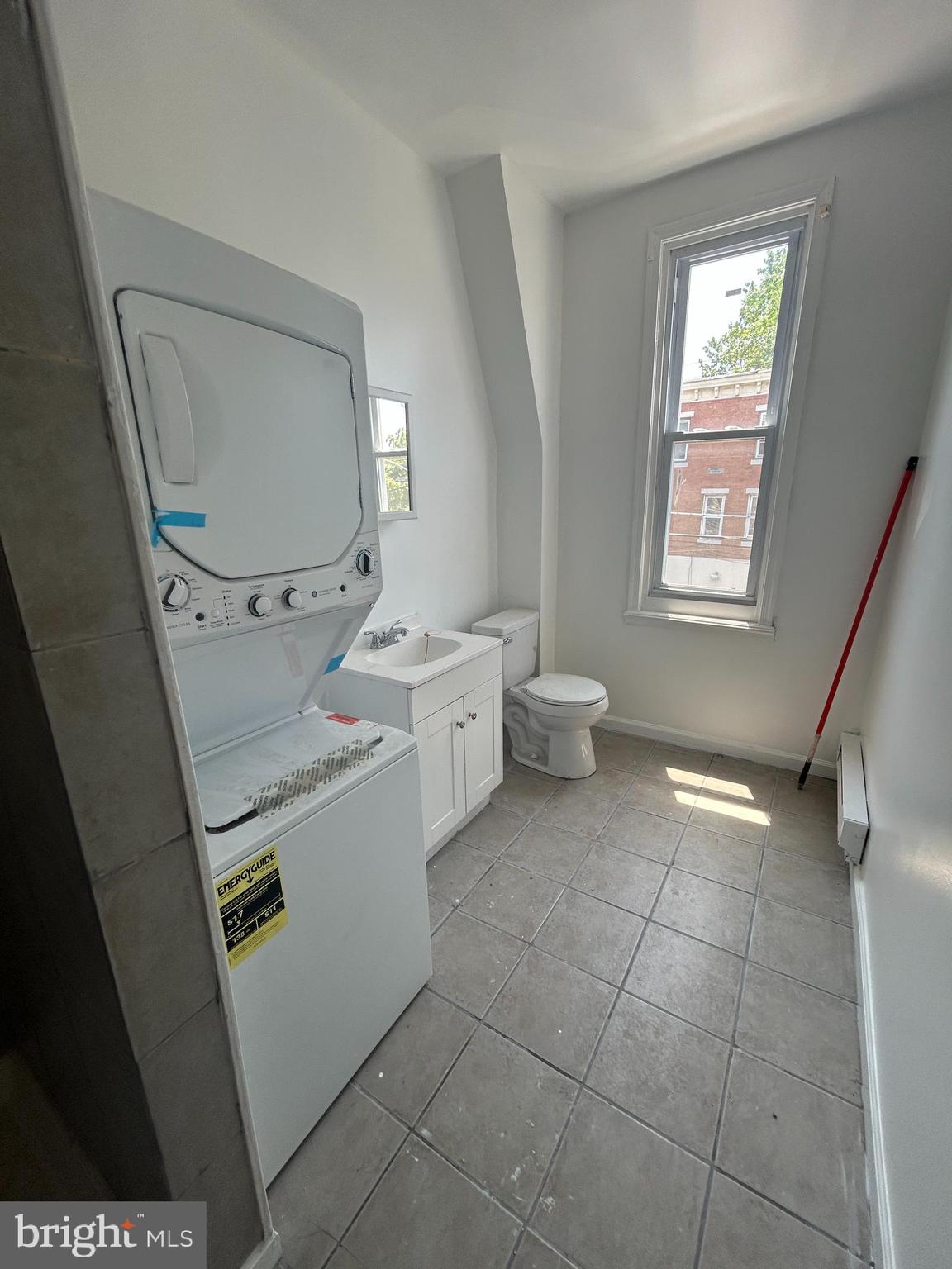 4100 Old York Road Philadelphia, PA 19140 - Photo 20 of 30 a storage room with washer and dryer
