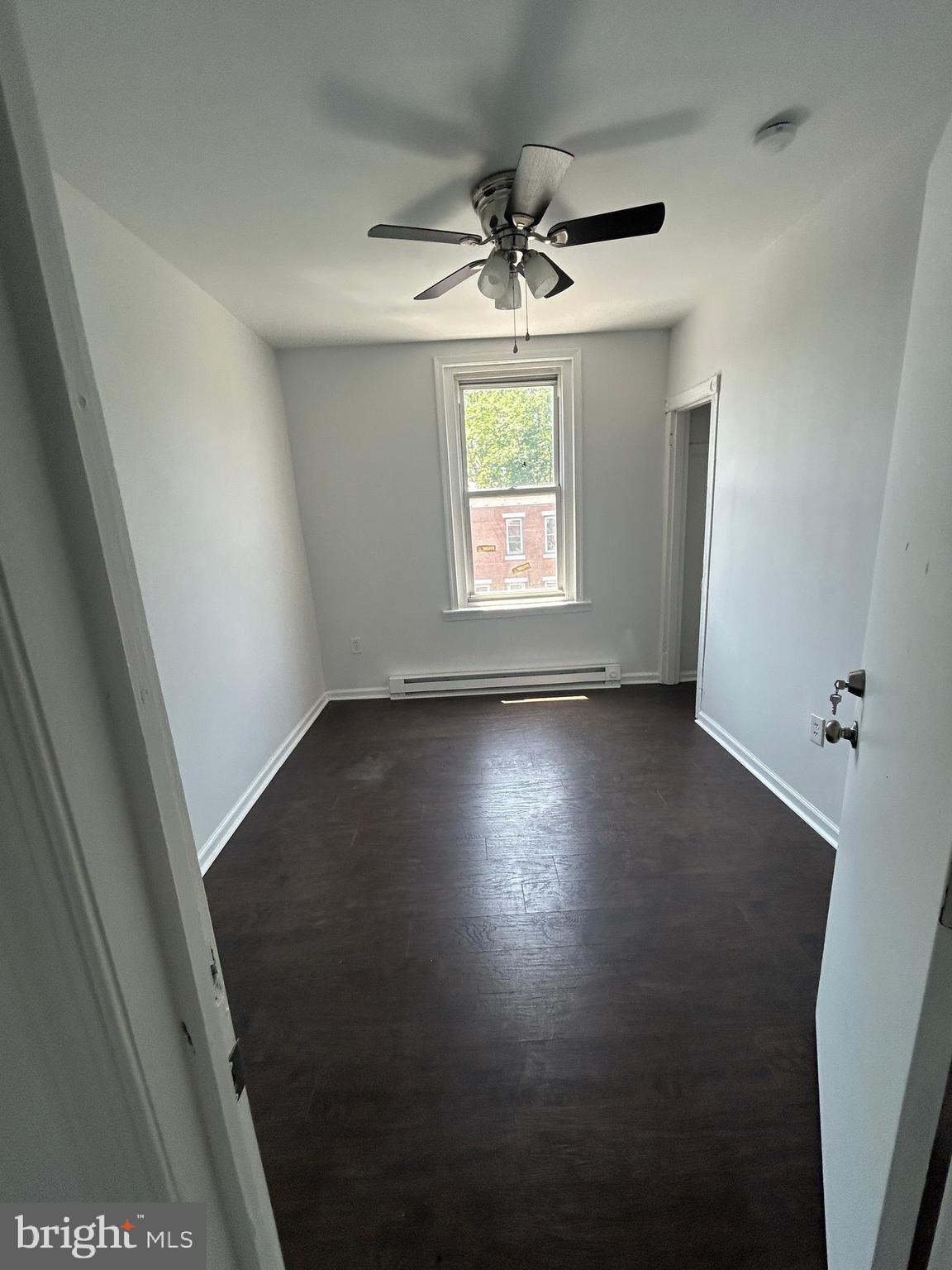 4100 Old York Road Philadelphia, PA 19140 - Photo 24 of 30 an empty room with wooden floor and windows