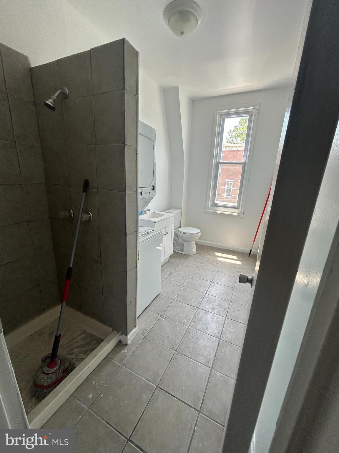 4100 Old York Road Philadelphia, PA 19140 - Photo 27 of 30 a bathroom with a sink and a toilet