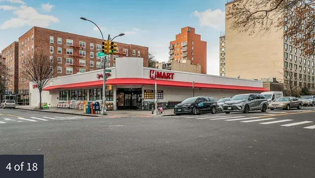 a view of a street with cars
