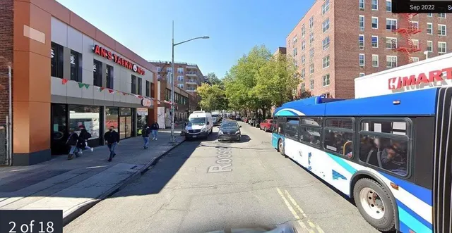 a view of a street with cars