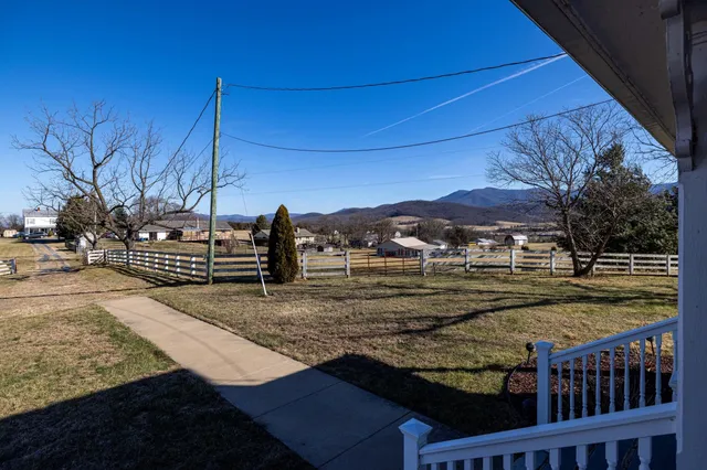 an aerial view of residential building and ocean view
