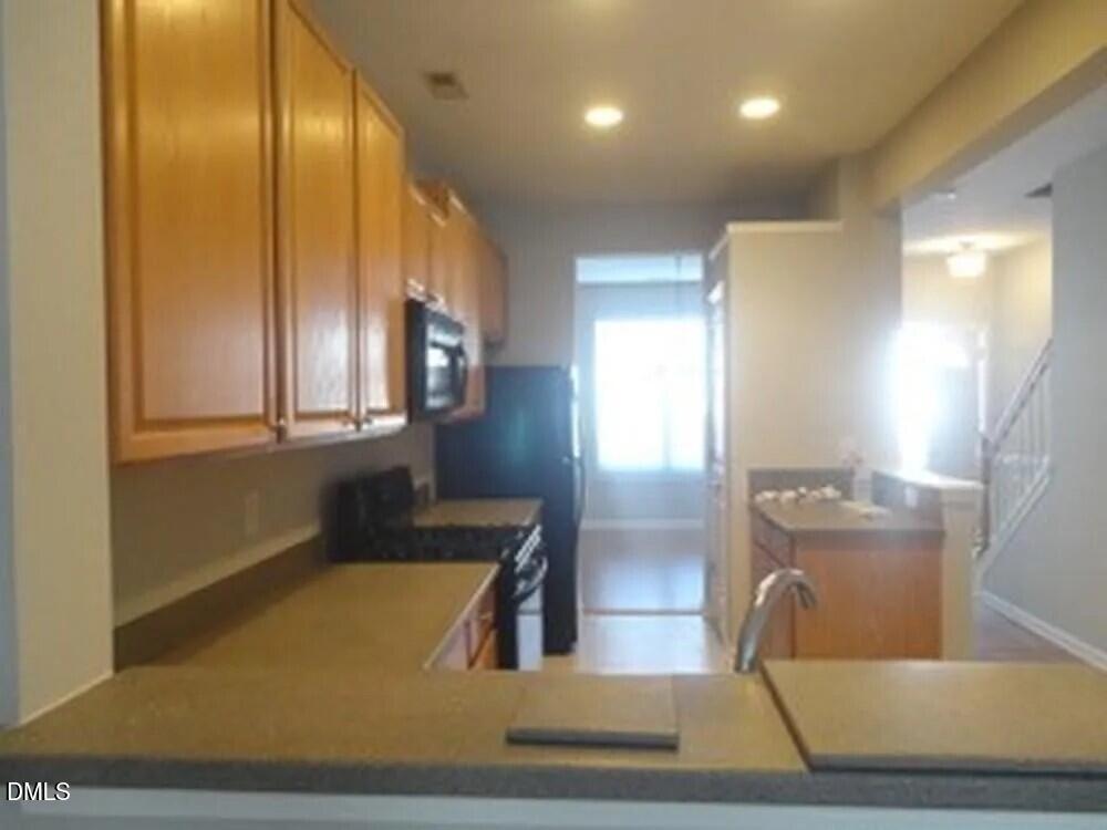 8455 Central Drive Raleigh, NC 27613 - Photo 4 of 7 Kitchen 2 - 8455 Central Drive