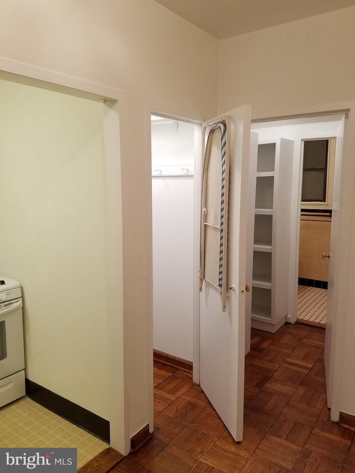 1 Scott Circle Northwest, Unit 102 Washington, DC 20005 - Photo 14 of 17 a view of walk in closet with empty racks
