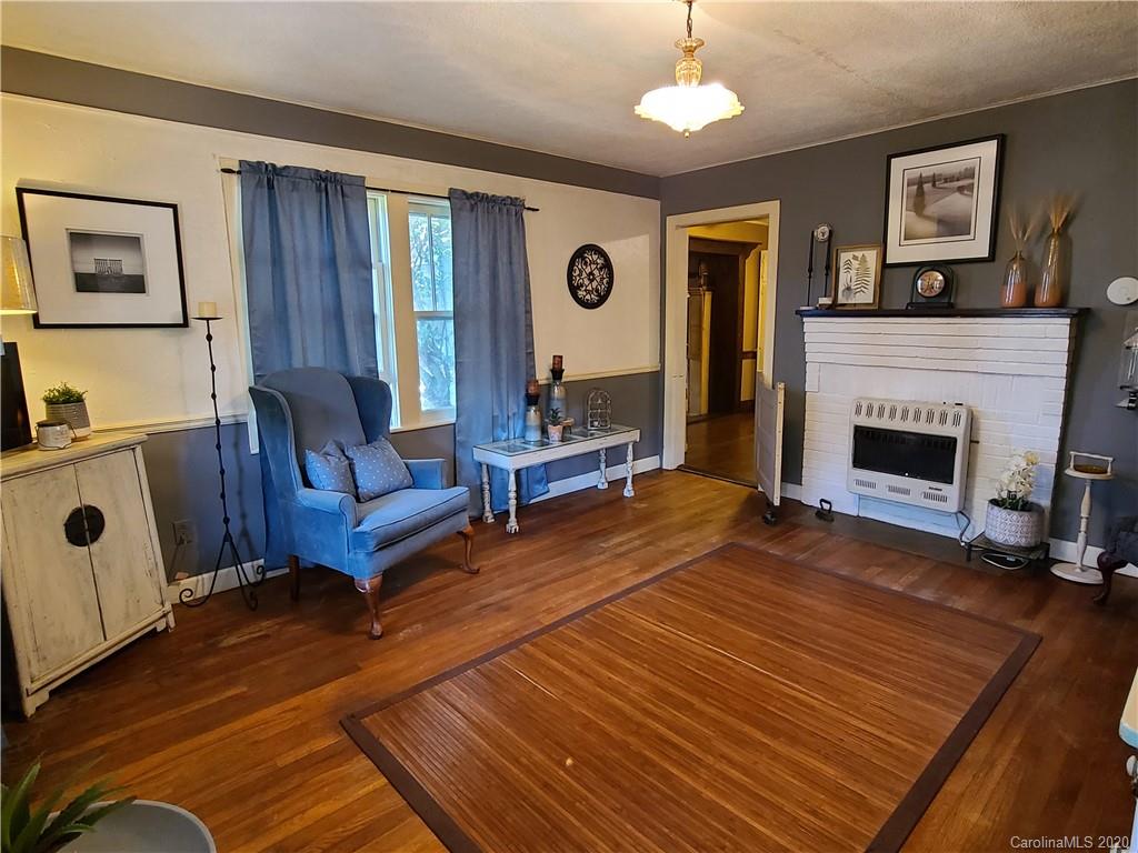 26 Jones Road Leicester, NC 28748 - Photo 16 of 34 a living room with furniture and a fireplace