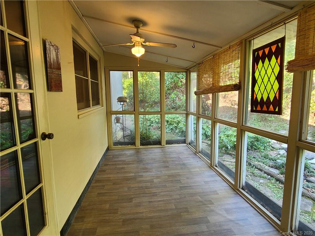 26 Jones Road Leicester, NC 28748 - Photo 7 of 34 a view of hallway with wooden floor