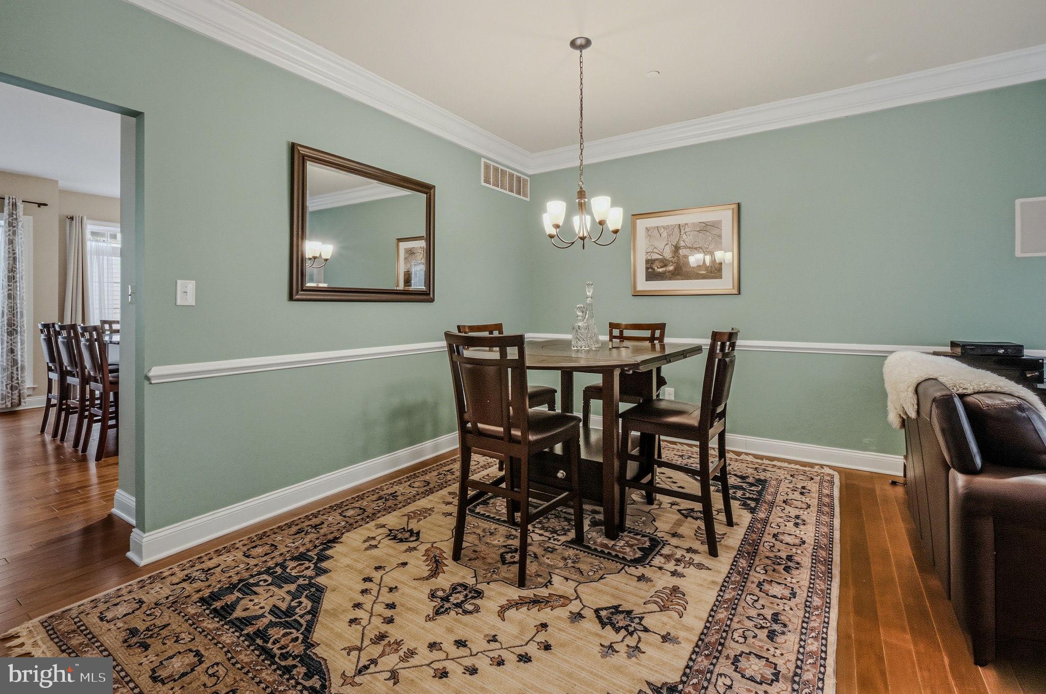 208 Jackdaw Alley, Unit 208 Springfield, PA 19064 - Photo 11 of 41 a view of a dining room with furniture