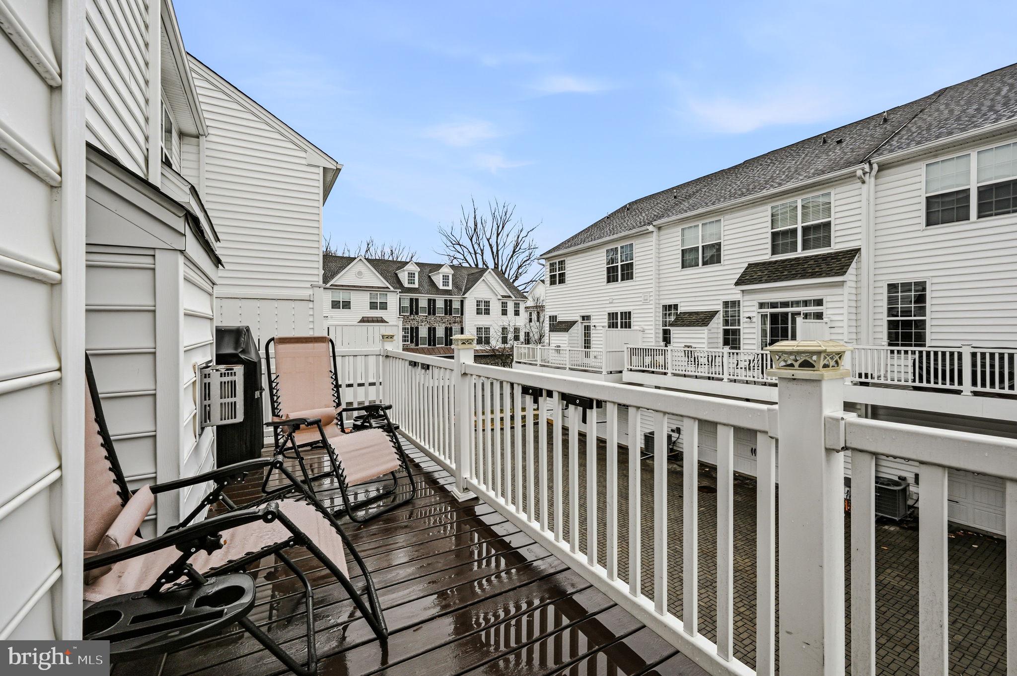 208 Jackdaw Alley, Unit 208 Springfield, PA 19064 - Photo 17 of 43 a view of a house with backyard and deck
