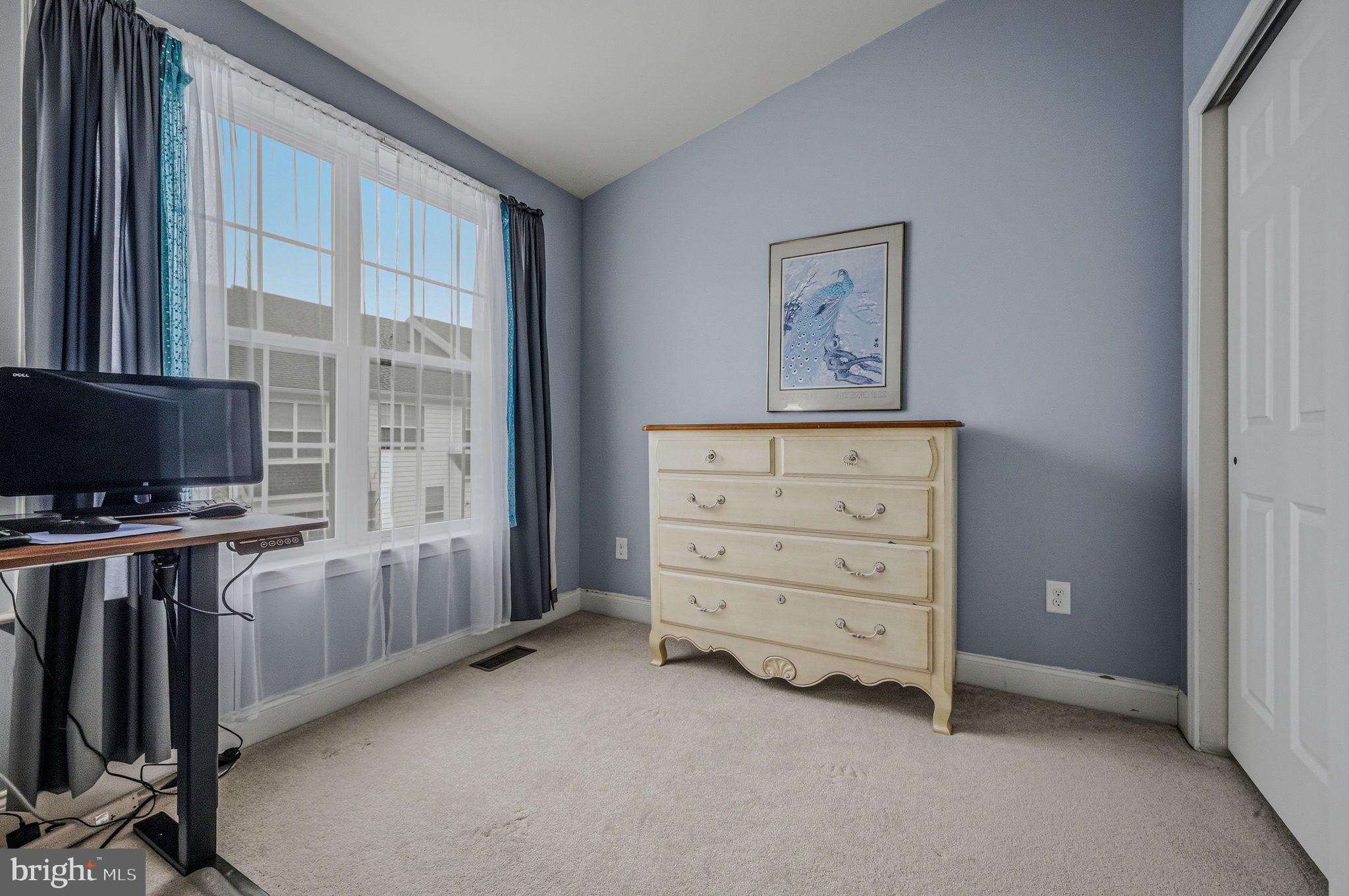 208 Jackdaw Alley, Unit 208 Springfield, PA 19064 - Photo 22 of 41 an empty room with furniture and windows