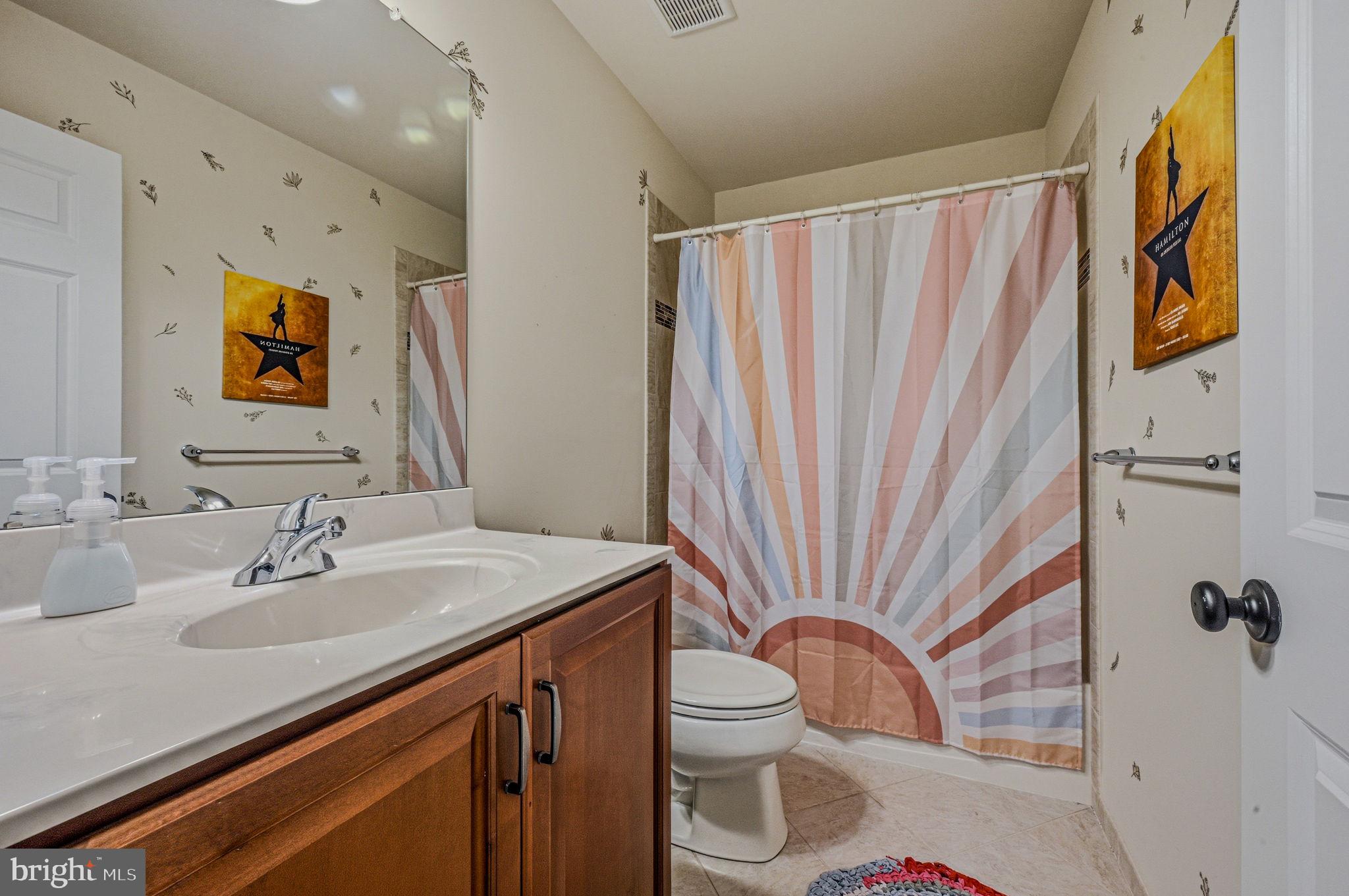 208 Jackdaw Alley, Unit 208 Springfield, PA 19064 - Photo 26 of 43 a bathroom with a sink toilet and shower