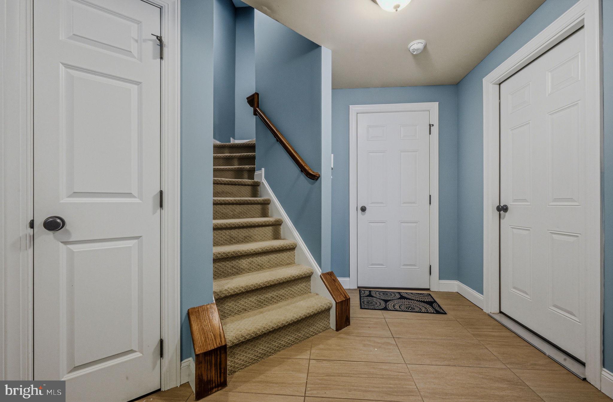 208 Jackdaw Alley, Unit 208 Springfield, PA 19064 - Photo 28 of 41 a view of a hallway with entryway and furniture
