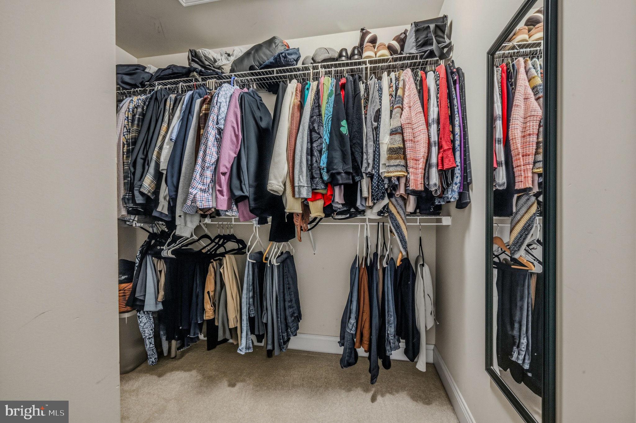 208 Jackdaw Alley, Unit 208 Springfield, PA 19064 - Photo 30 of 43 a view of walk in closet with clothes