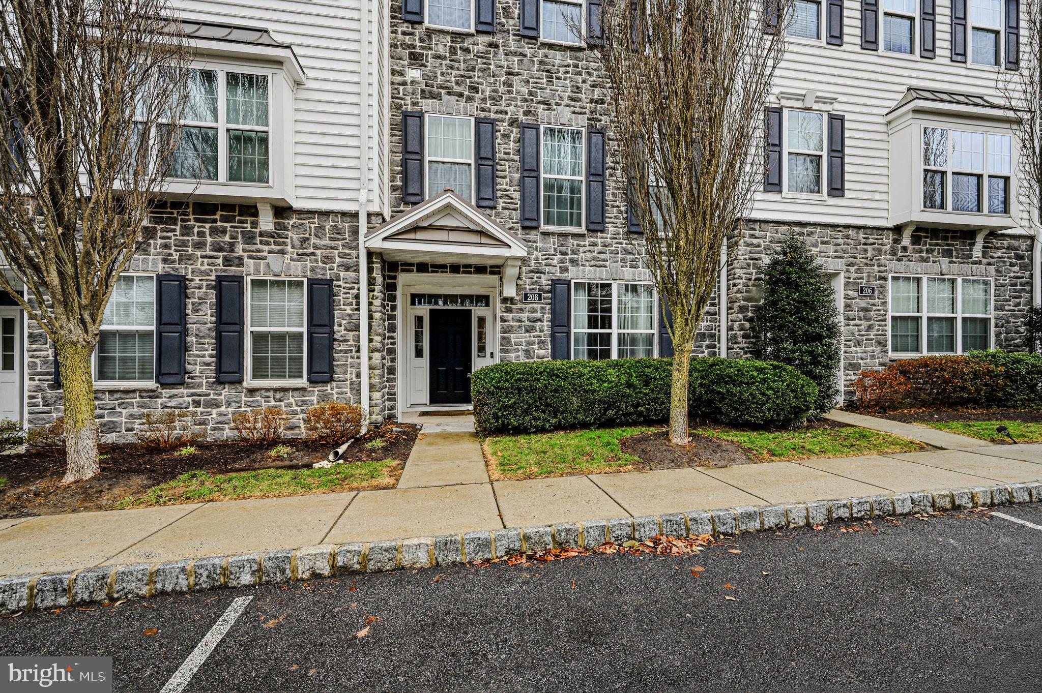 208 Jackdaw Alley, Unit 208 Springfield, PA 19064 - Photo 35 of 41 a front view of a house