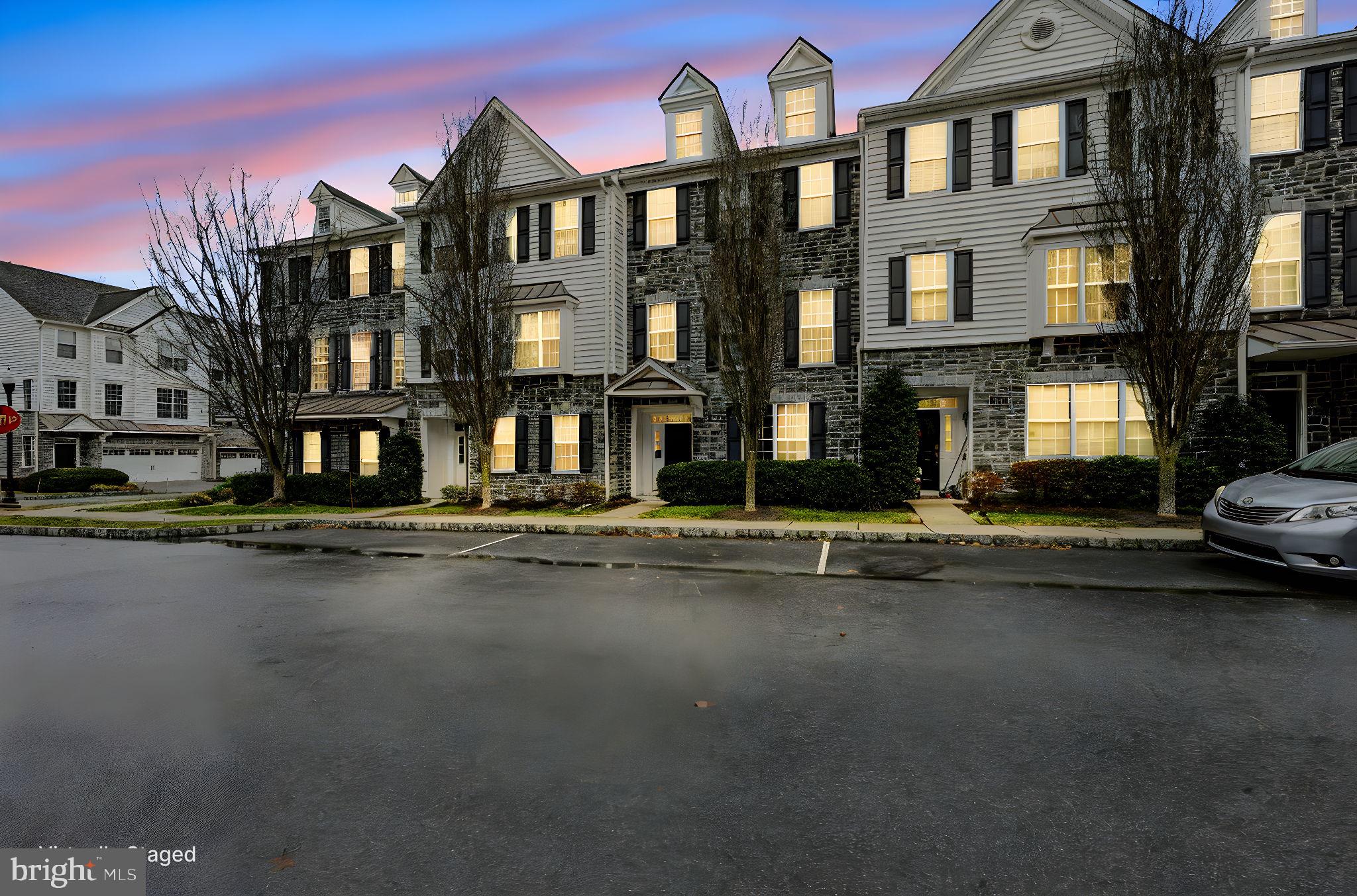 208 Jackdaw Alley, Unit 208 Springfield, PA 19064 - Photo 41 of 41 a front view of a building with lot of street