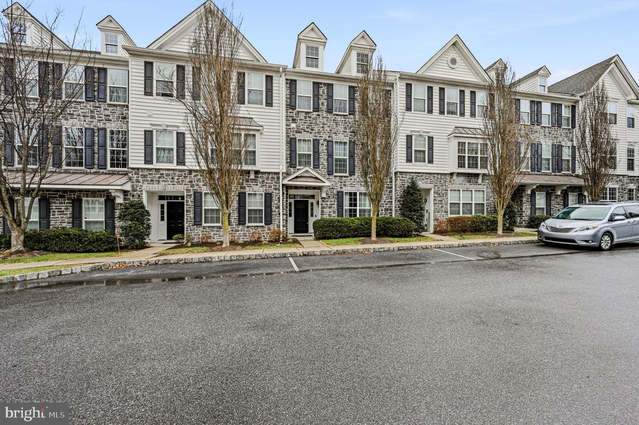 208 Jackdaw Alley, Unit 208 Springfield, PA 19064 - Photo 43 of 43 front view of a building with a street