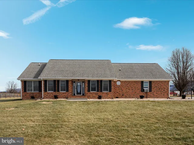 a bathroom with a shower and a mirror