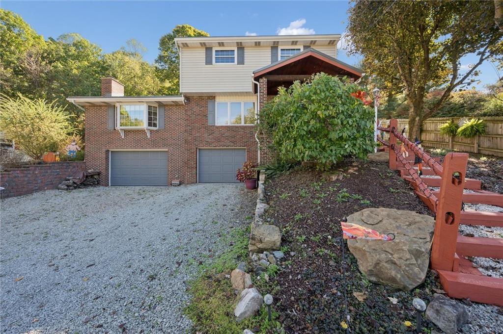 4941 Bulltown Road Murrysville, PA 15668 - Photo 1 of 39 a view of a house with a yard