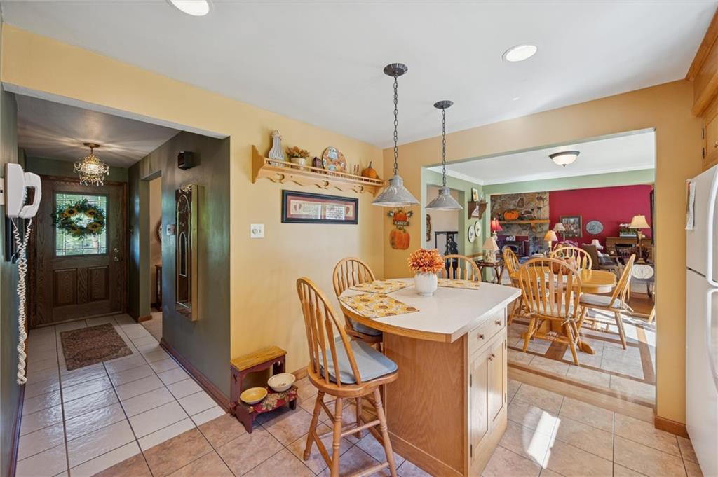 4941 Bulltown Road Murrysville, PA 15668 - Photo 15 of 39 a view of a dining room with furniture