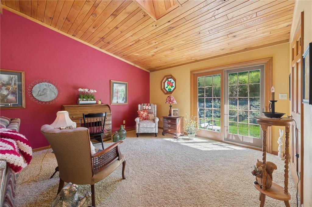 4941 Bulltown Road Murrysville, PA 15668 - Photo 17 of 39 a living room with furniture and a window