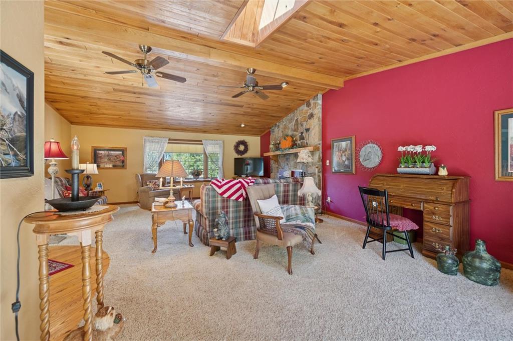 4941 Bulltown Road Murrysville, PA 15668 - Photo 18 of 39 a living room with furniture and a flat screen tv