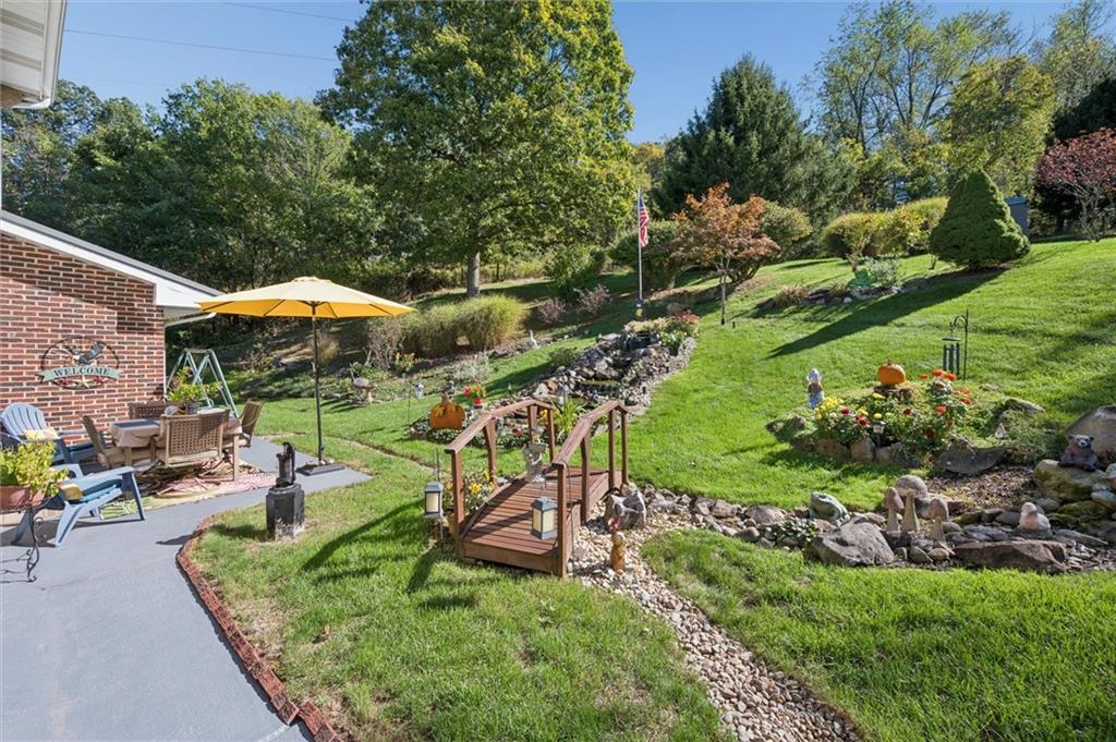 4941 Bulltown Road Murrysville, PA 15668 - Photo 37 of 39 an outdoor space with patio and green space