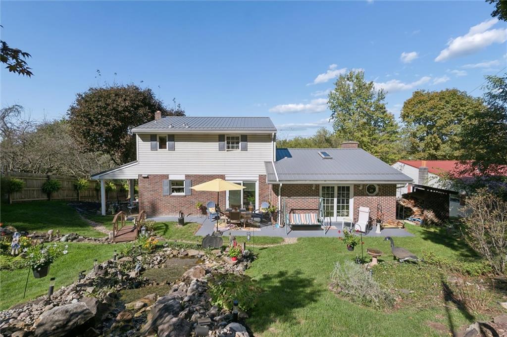 4941 Bulltown Road Murrysville, PA 15668 - Photo 39 of 39 a front view of a house with garden