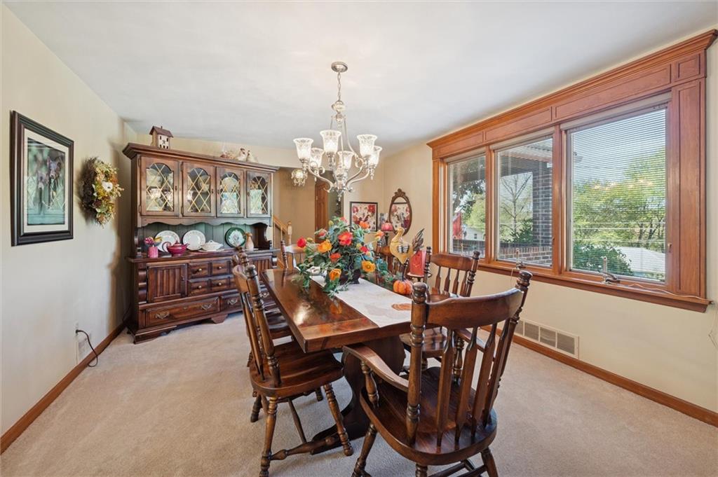 4941 Bulltown Road Murrysville, PA 15668 - Photo 9 of 39 a view of a dining room with furniture window and outside view