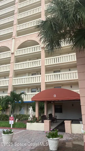 a front view of a building with street