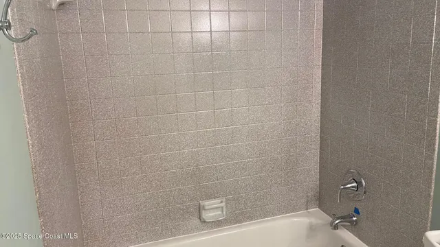 a bathroom with a bathtub