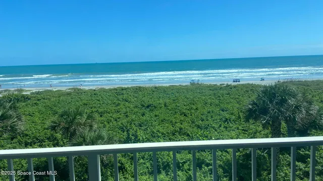 a view of an ocean from a balcony
