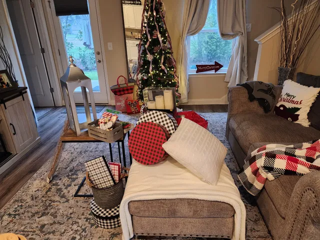 a bedroom with furniture and a window