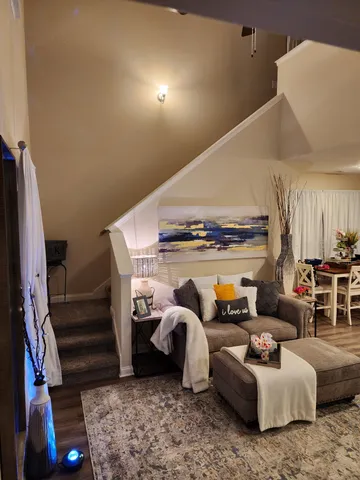 a living room with furniture and a couch