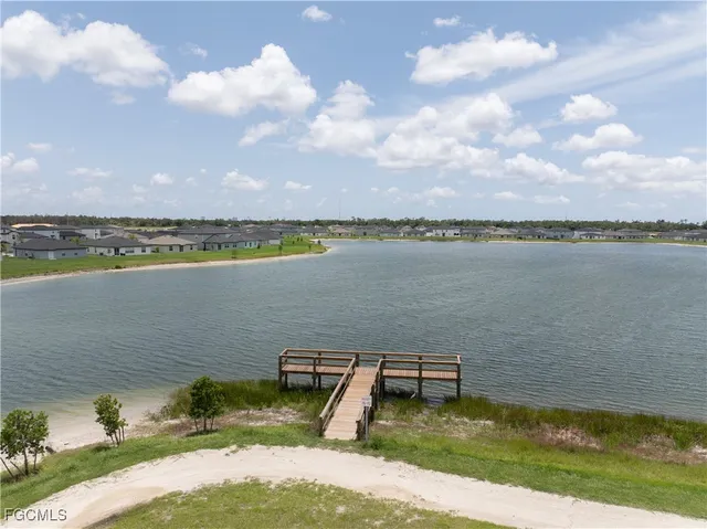a view of a lake with a big yard