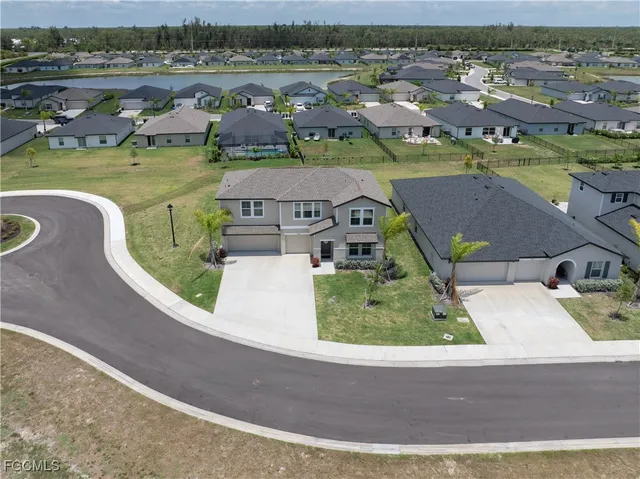 an aerial view of a house with a outdoor space
