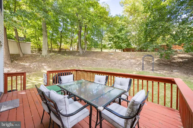 a view of a balcony with furniture