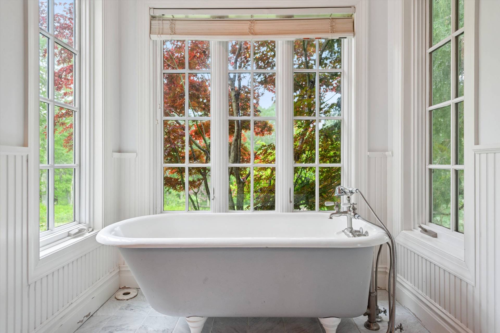 200 Great Hill Road Southampton, NY 11968 - Photo 14 of 44 a bathroom with a bathtub and window