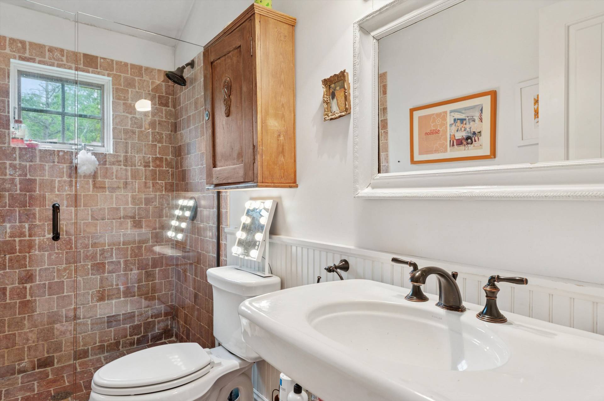200 Great Hill Road Southampton, NY 11968 - Photo 20 of 44 a bathroom with a sink a toilet and shower