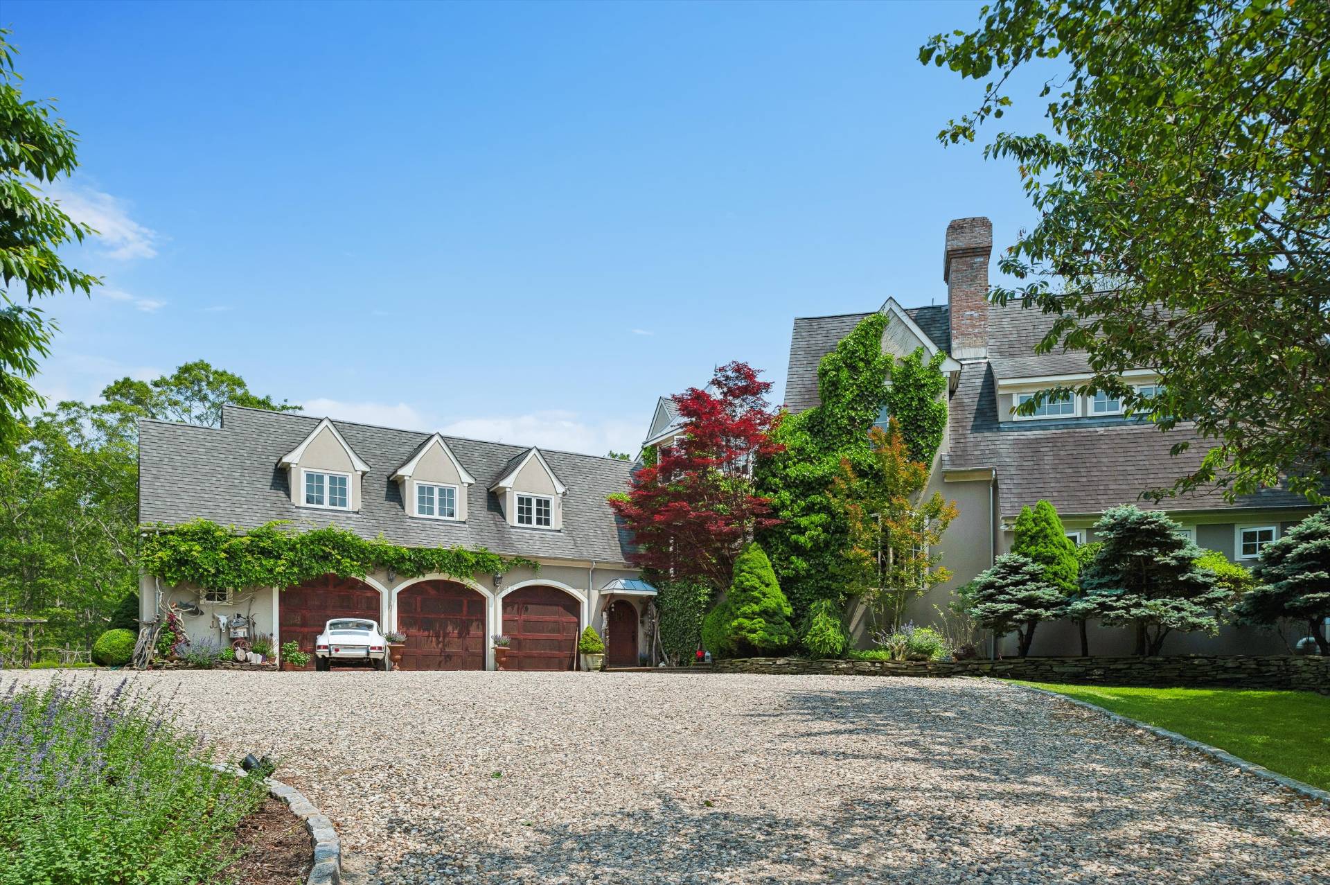 200 Great Hill Road Southampton, NY 11968 - Photo 2 of 44 front view of a house with a yard