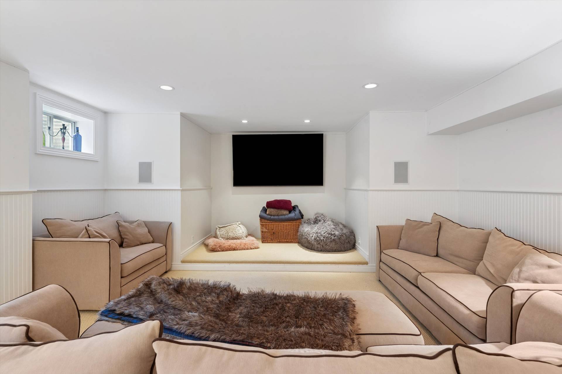 200 Great Hill Road Southampton, NY 11968 - Photo 29 of 44 a living room with furniture and a flat screen tv
