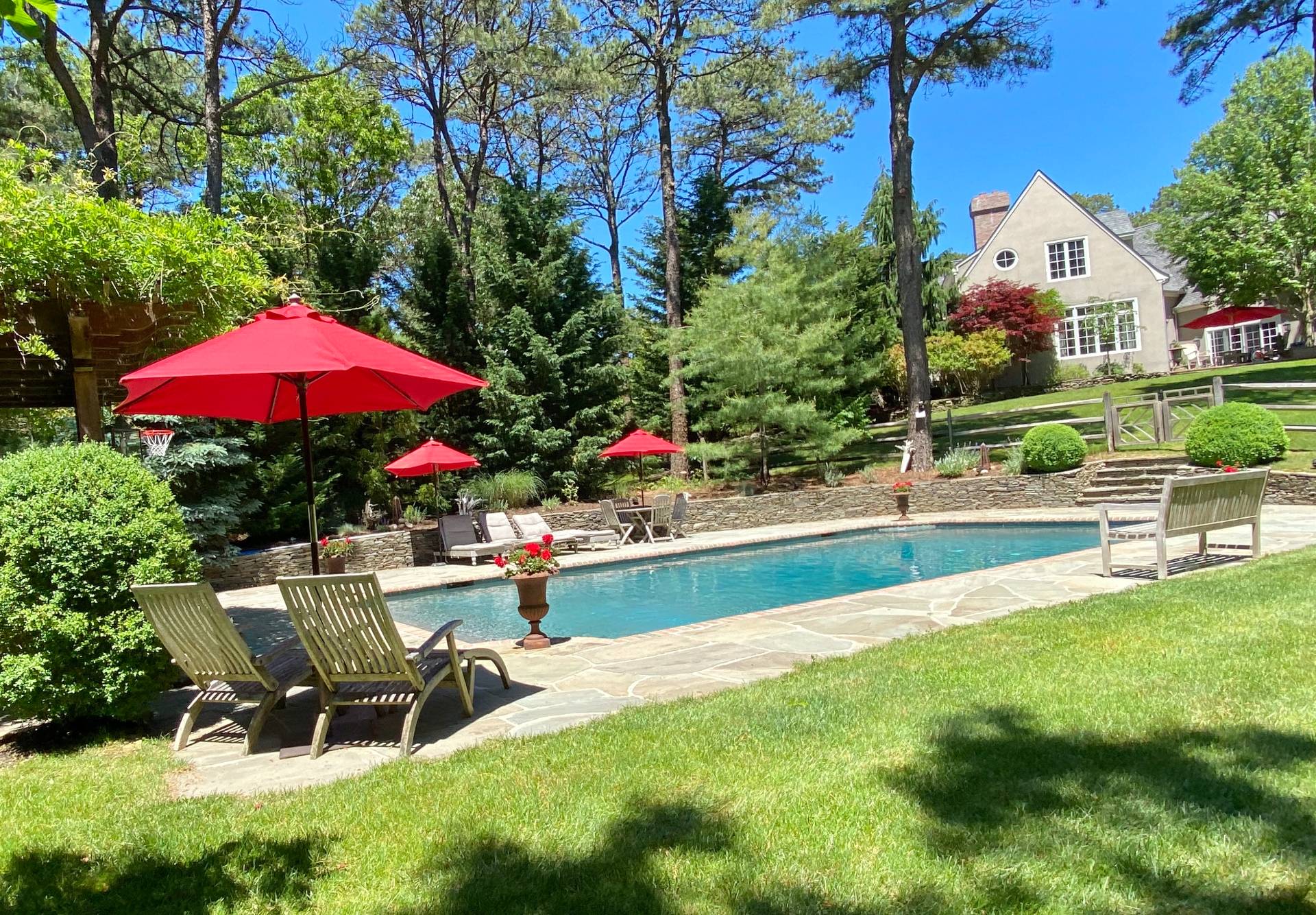 200 Great Hill Road Southampton, NY 11968 - Photo 33 of 44 an outdoor space with swimming pool and furniture