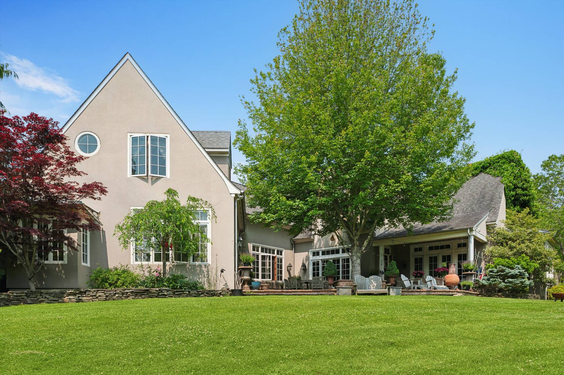 200 Great Hill Road Southampton, NY 11968 - Photo 35 of 44 a front view of house with yard and green space