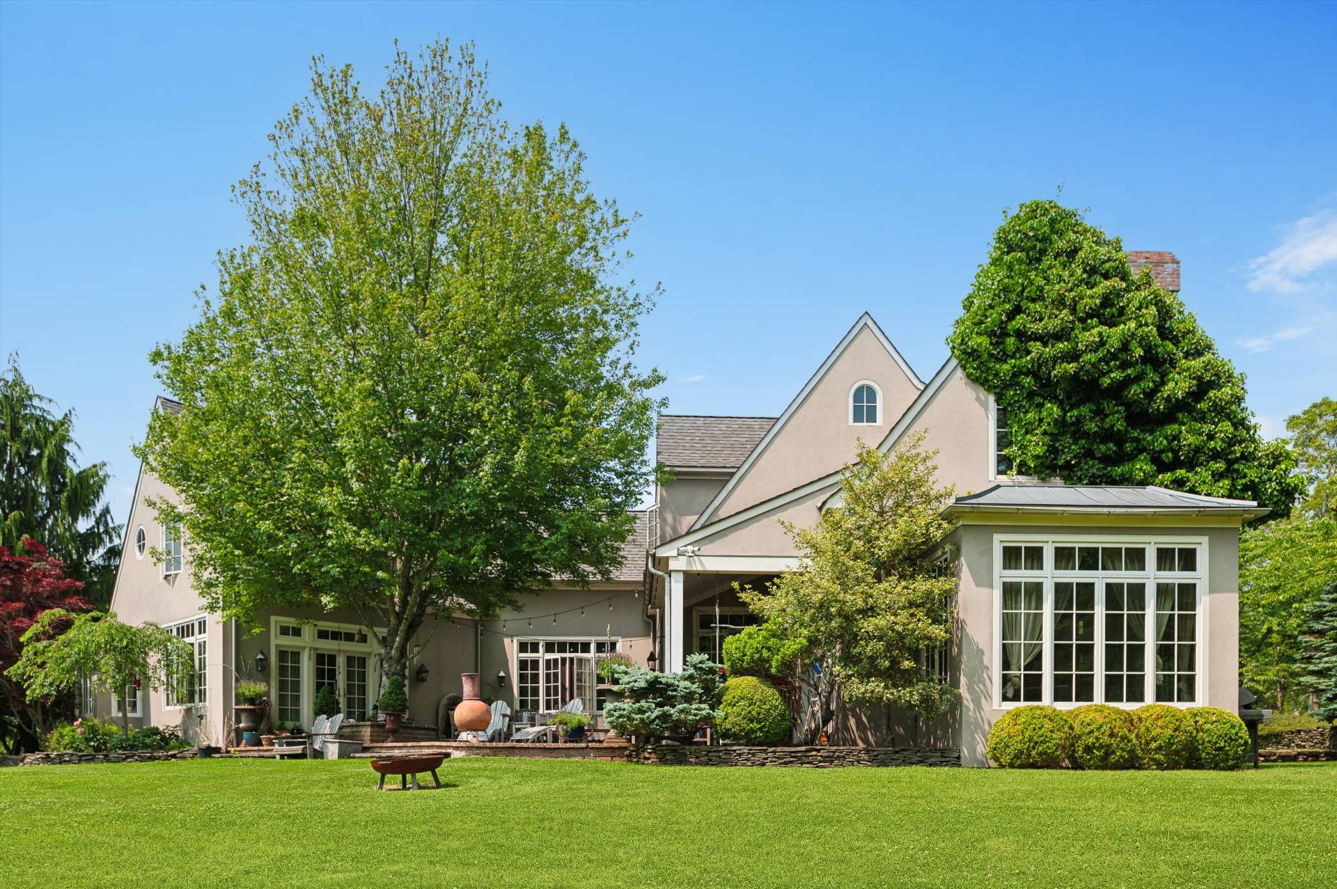 200 Great Hill Road Southampton, NY 11968 - Photo 36 of 44 a front view of a house with garden