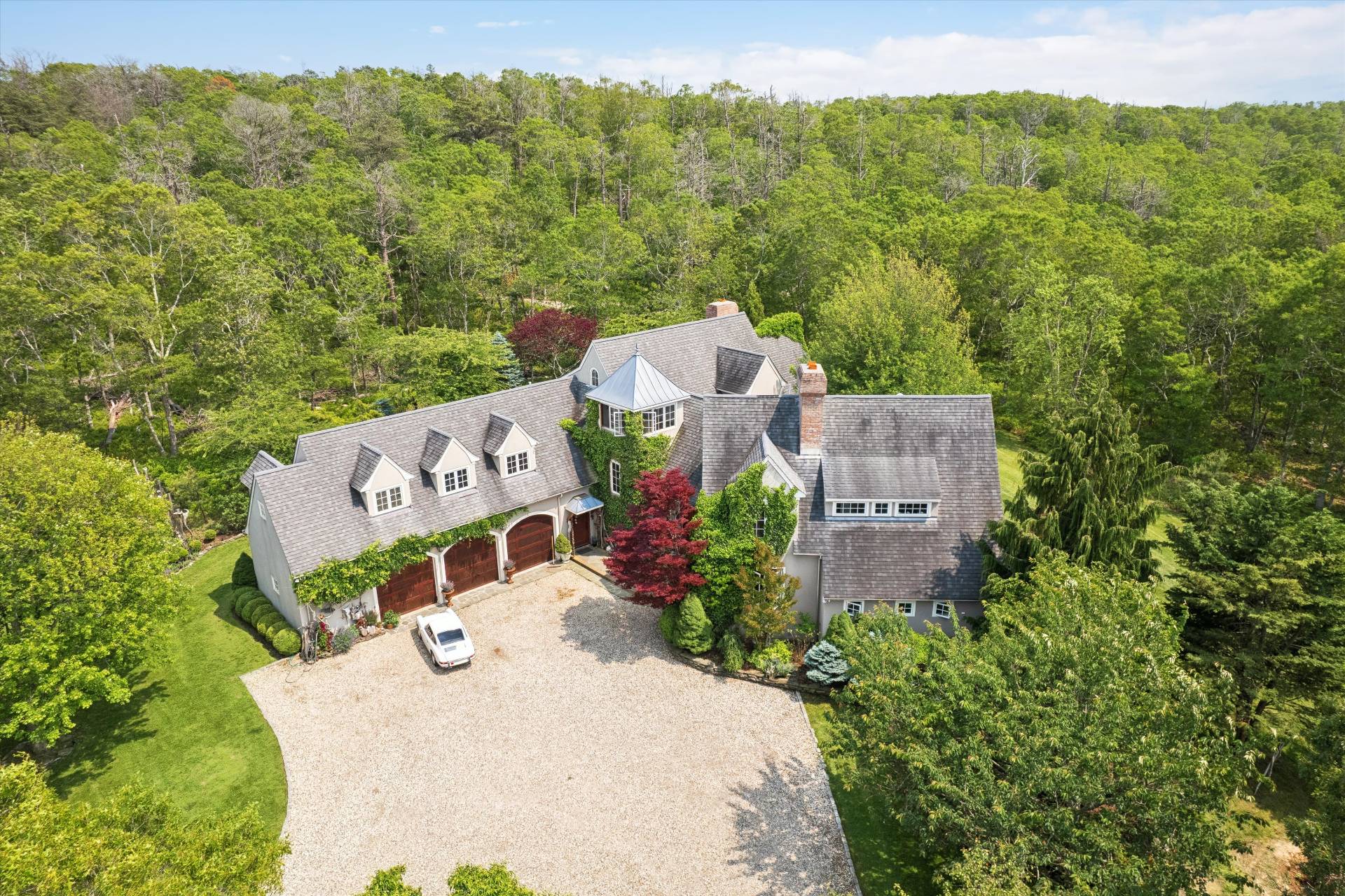 200 Great Hill Road Southampton, NY 11968 - Photo 42 of 44 an aerial view of a house with a yard