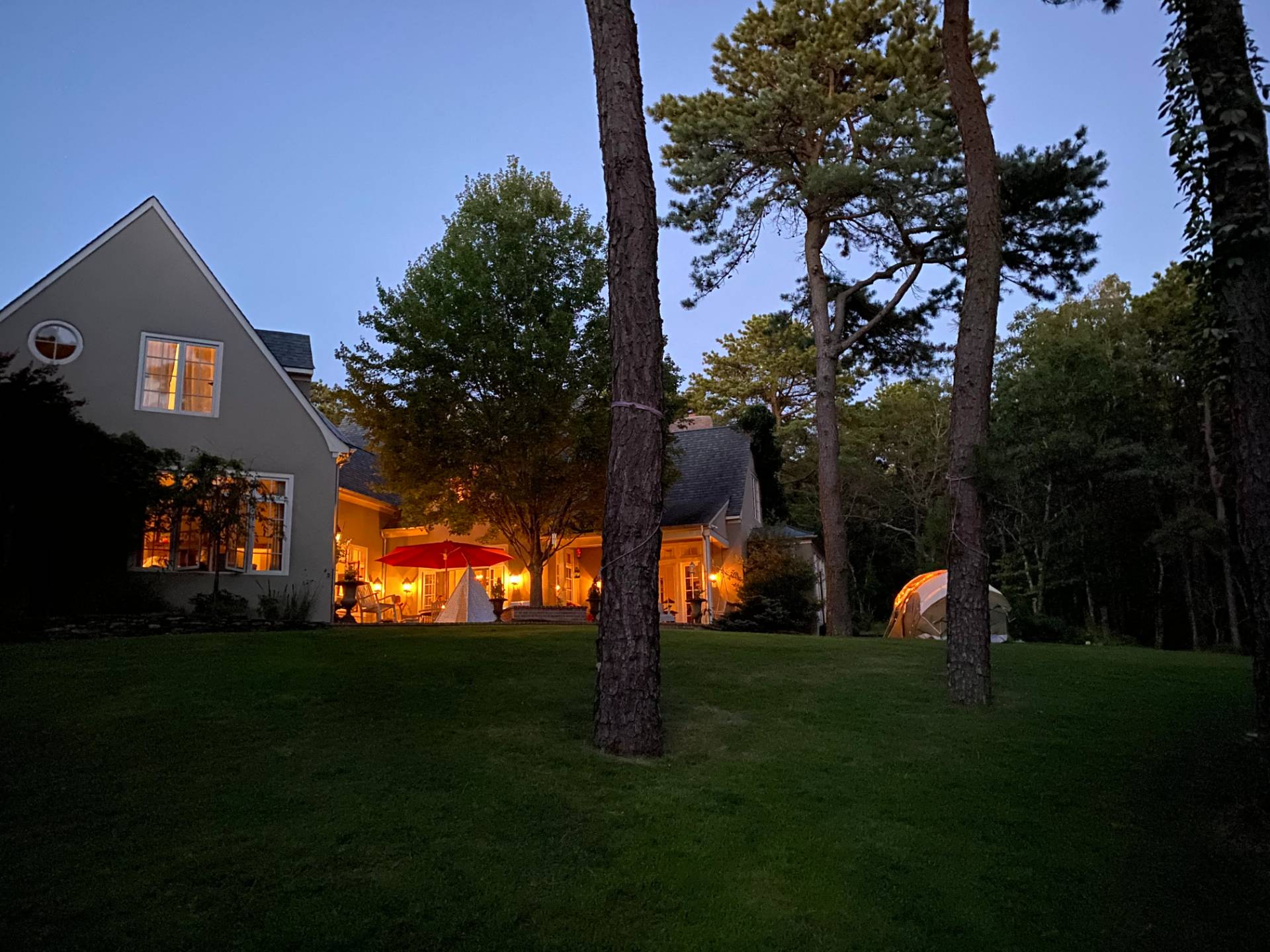 200 Great Hill Road Southampton, NY 11968 - Photo 44 of 44 a front view of a house with a yard and trees