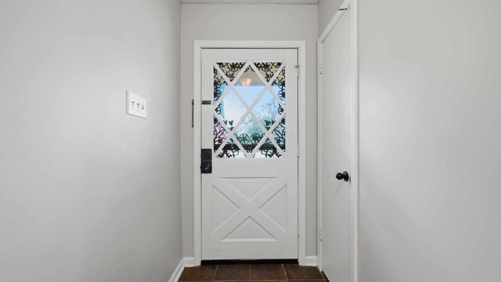 4182 Luther Road Bartlett, TN 38135 - Photo 12 of 40 a view of a hallway with a painting on the wall